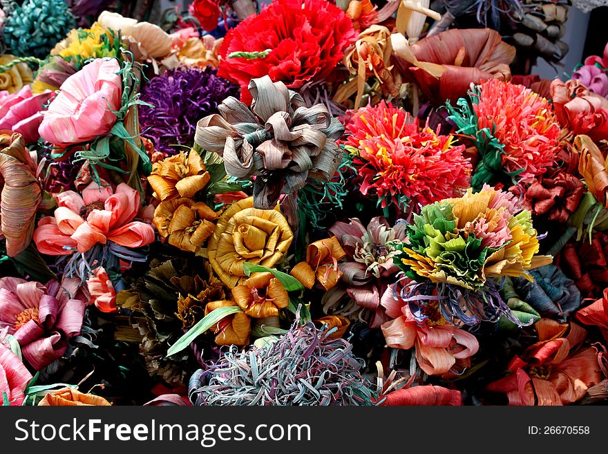 Handmade colored paper flowers exposed for decorative