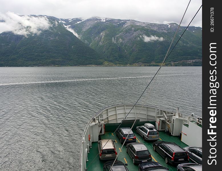 Ferry with cars on a fjord in Norway