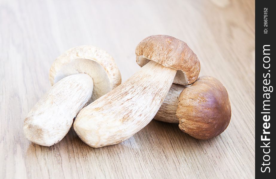 Fresh forest mushrooms on a  wood table