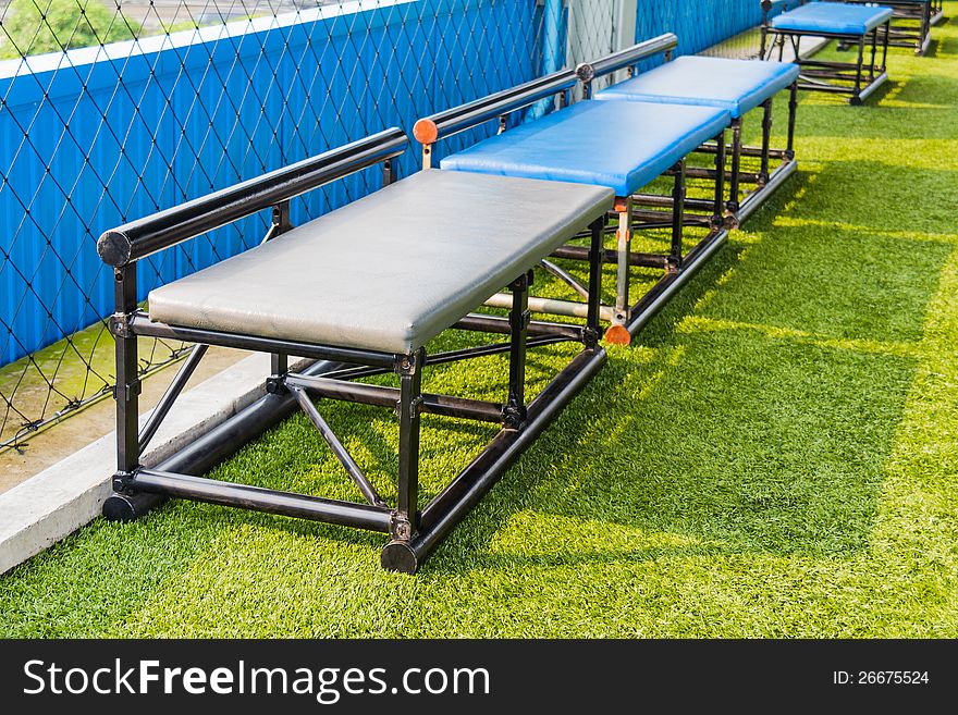 Seats for substitutes or reserves in indoor futsal pitch. Seats for substitutes or reserves in indoor futsal pitch