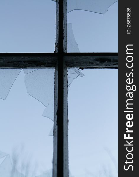 Cross and broken window