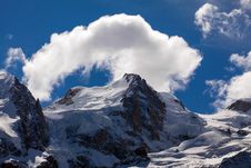 Snow Covered Mountains And Rocky Peaks In The Alps Royalty Free Stock Image Snow Covered Mountains And Rocky Peaks In The Alps Royalty Free Stock Image