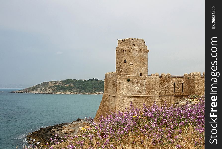 Aragonese Castle, located on a small island in the Ionian Sea in the vicinity of the village of Le Castella. Aragonese Castle, located on a small island in the Ionian Sea in the vicinity of the village of Le Castella