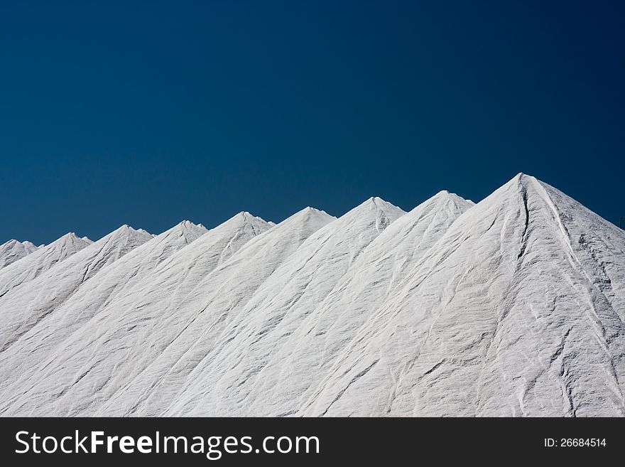 Mountains of salt at Santa Pola, Spain, obtained from the evaporation of sea water. Mountains of salt at Santa Pola, Spain, obtained from the evaporation of sea water