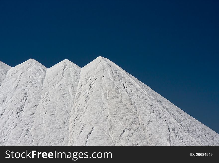 Mountains of salt at Santa Pola, Spain, obtained from the evaporation of sea water. Mountains of salt at Santa Pola, Spain, obtained from the evaporation of sea water