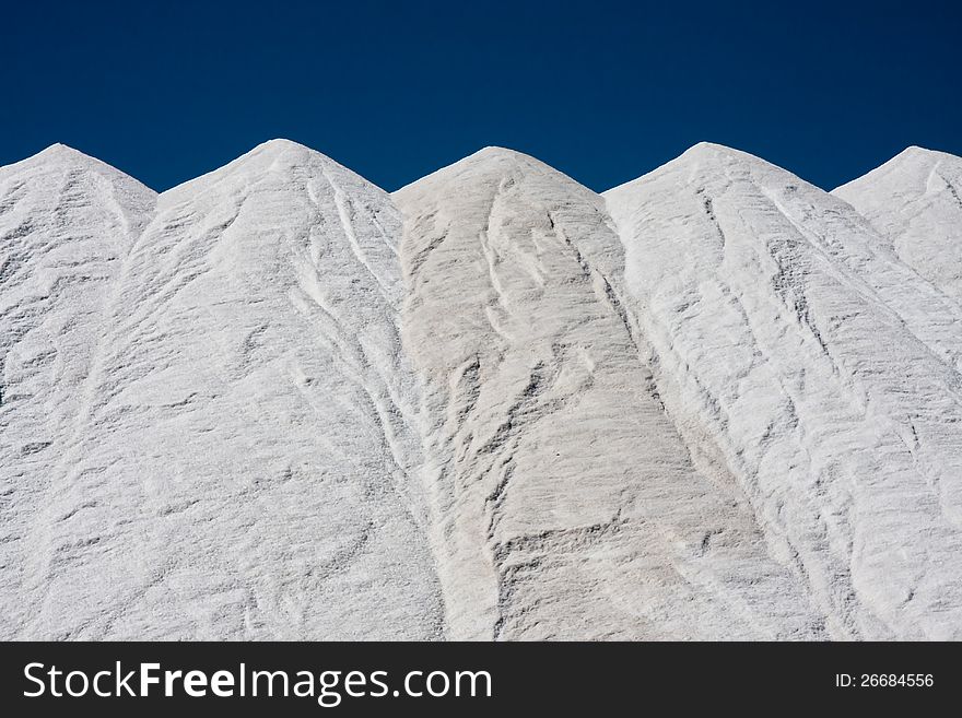 Mountains of salt at Santa Pola, Spain, obtained from the evaporation of sea water. Mountains of salt at Santa Pola, Spain, obtained from the evaporation of sea water