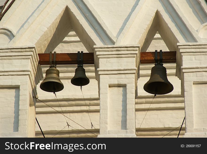 Three bells on the white church. Three bells on the white church
