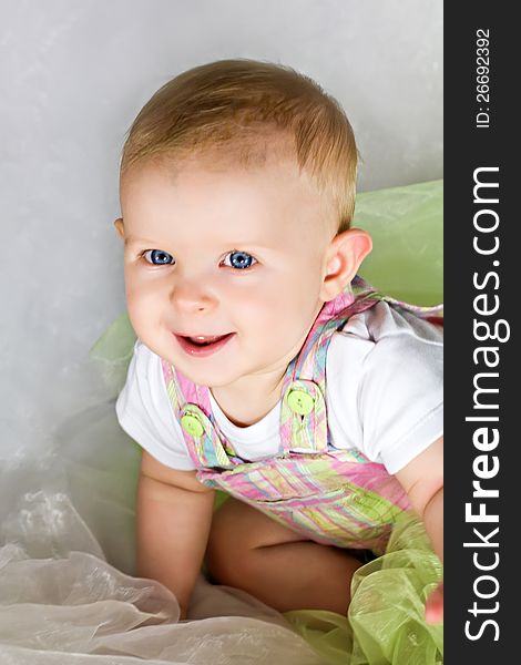 Funny baby girl crawling and smiling