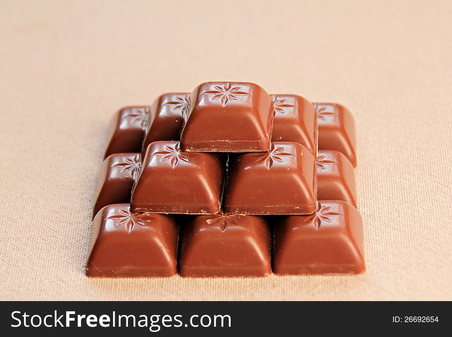 Pyramid from the pieces of milk chocolate