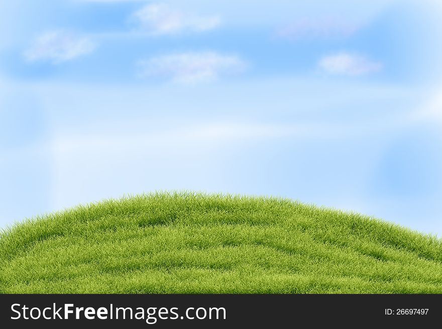 Summer landscape with green grass and clouds.