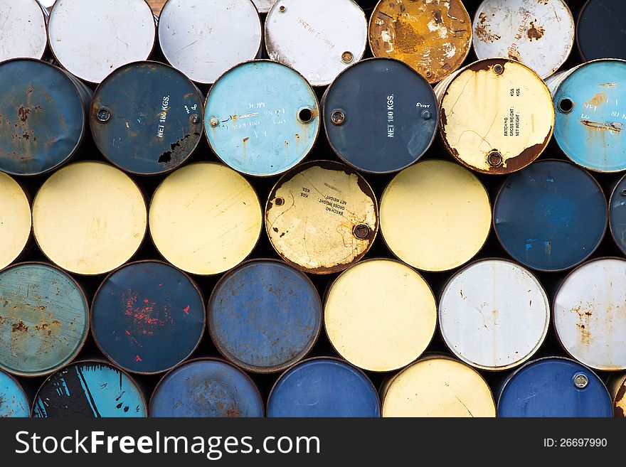 Old fuel tanks stacked background