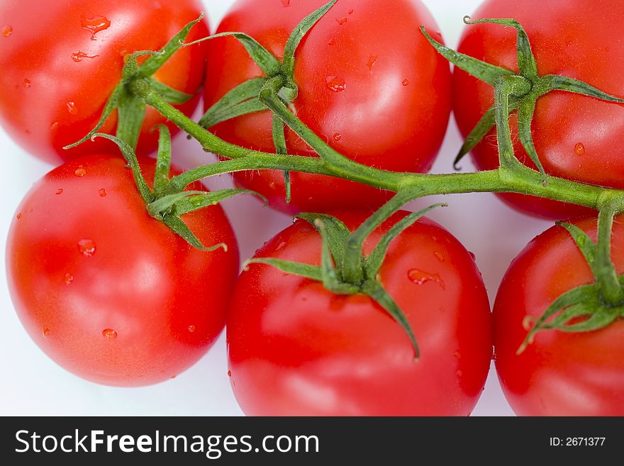 Red ripe tomatoes on white background. Red ripe tomatoes on white background