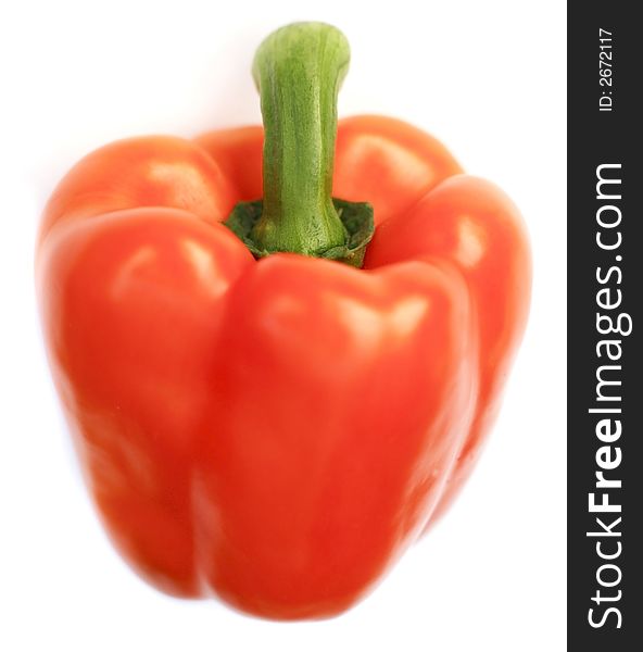 Fresh organic orange pepper on white background