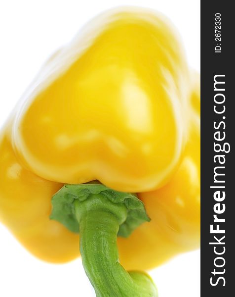 Fresh organic yellow pepper on white background