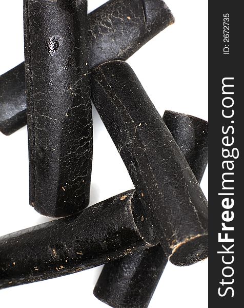 Close-up of Liquorice sweets on white background