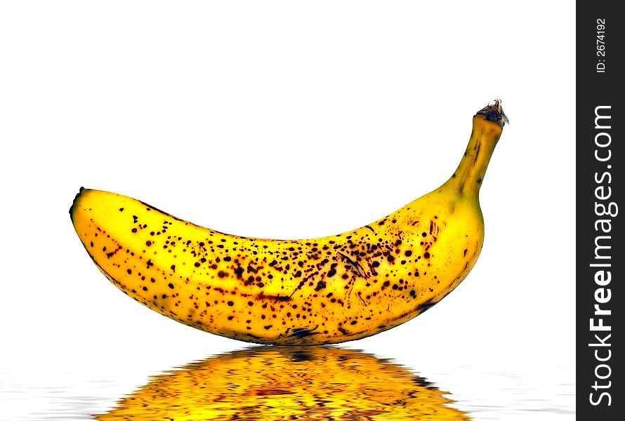 A Ripe Banana isolated against a white background