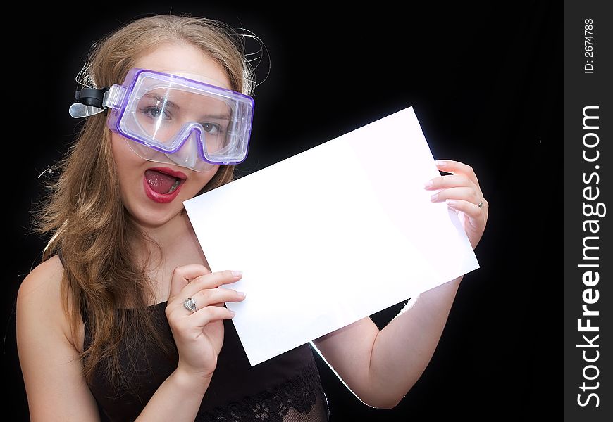 Girl in mask hold a sheet of paper