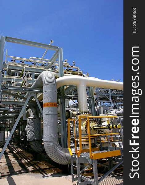 Industrial installation of pipes and tanks. Industrial installation of pipes and tanks