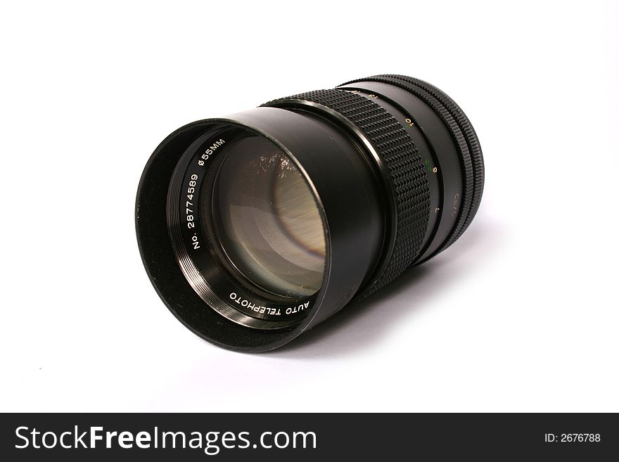 Front view of a 135 mm camera lens. Front view of a 135 mm camera lens