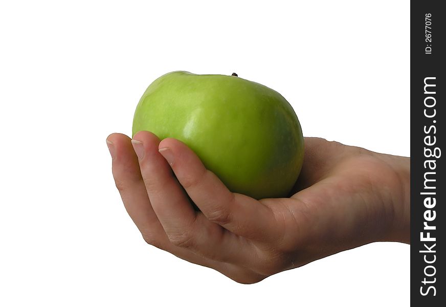 Green apple in hand, isolated