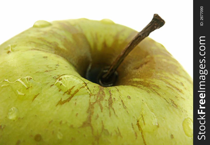Isolated grean apple close-up. Isolated grean apple close-up