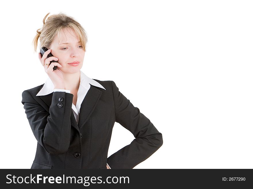 A blond business woman on the phone. A blond business woman on the phone