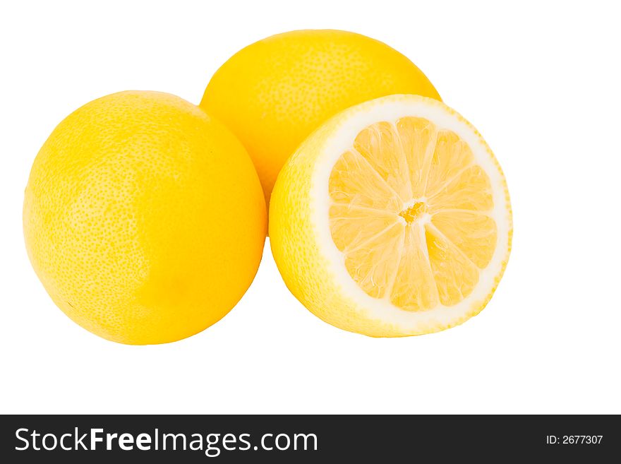 Two and a half lemons on a white background