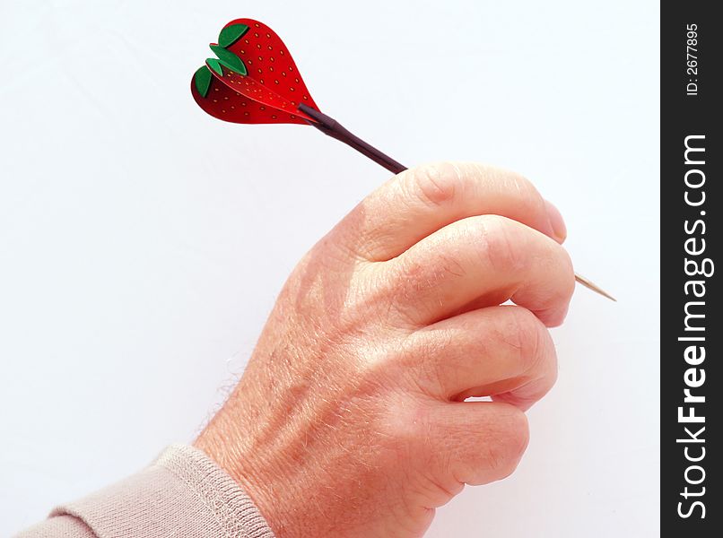 Man throwing a strawberry heart symbol of love. Man throwing a strawberry heart symbol of love