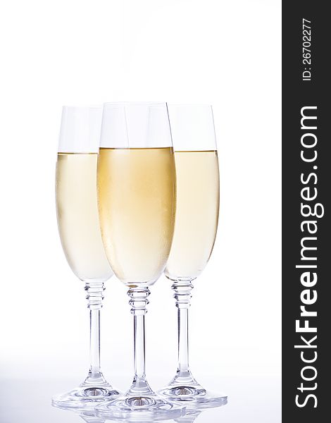 Photograph of three glasses of fancy champagne