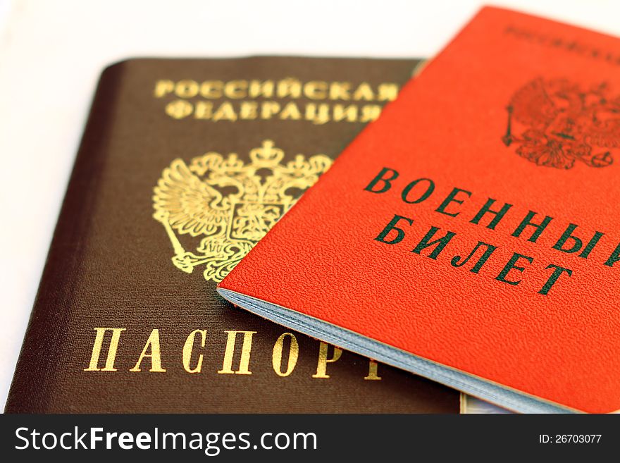 Military ticket and passport of the Russian Federation on a white background