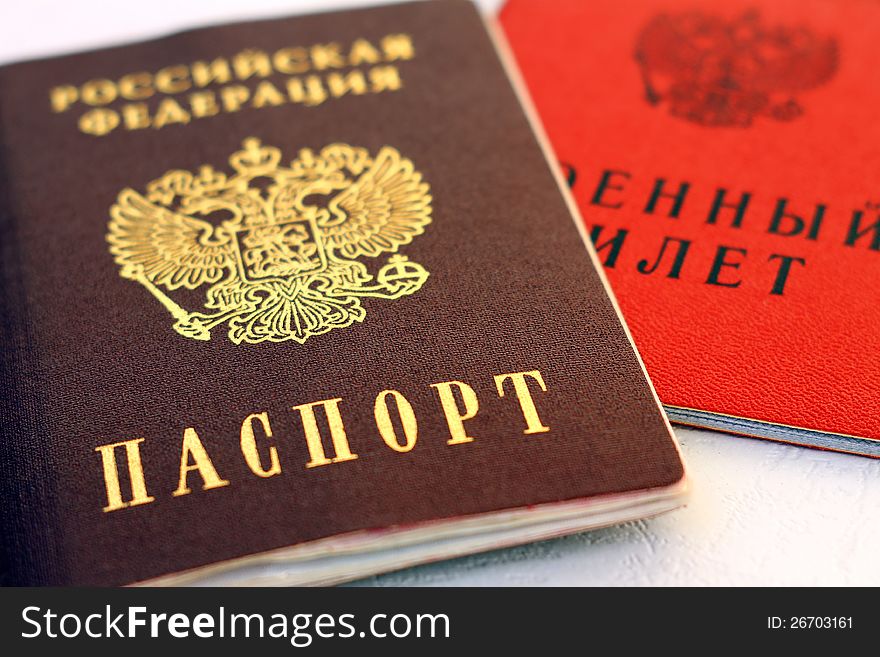 Military ticket and passport of the Russian Federation on a white background