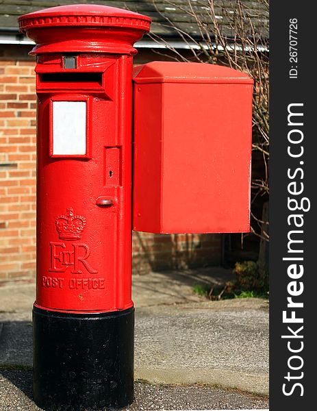 Image of a red british post box in London. Image of a red british post box in London