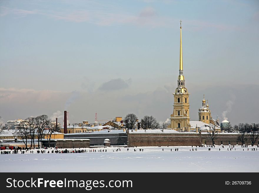 View of the Peter and Paul Fortress on a cold winter day. View of the Peter and Paul Fortress on a cold winter day.