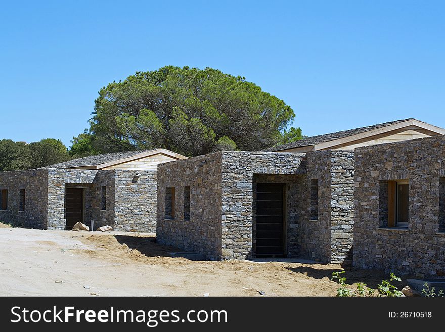 Row of Typical Corsican Terraced Houses in construction. Row of Typical Corsican Terraced Houses in construction.