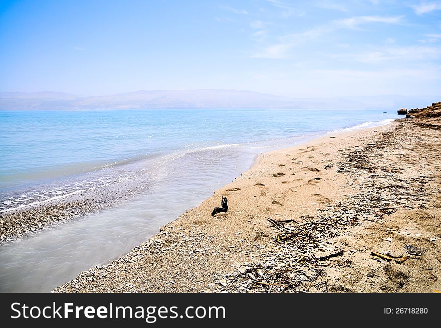 View on the empty beach of the Dead Sea. View on the empty beach of the Dead Sea