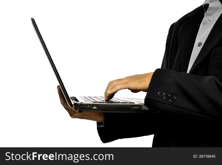 Man holding laptop and typing with hand isolated over white background. Man holding laptop and typing with hand isolated over white background