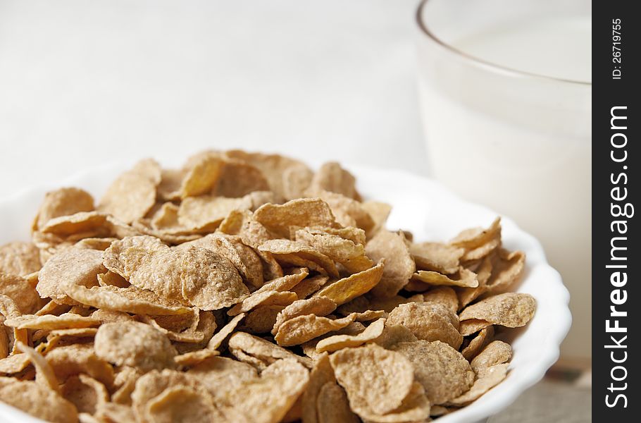 Corn-flakes and milk close up photo. Corn-flakes and milk close up photo