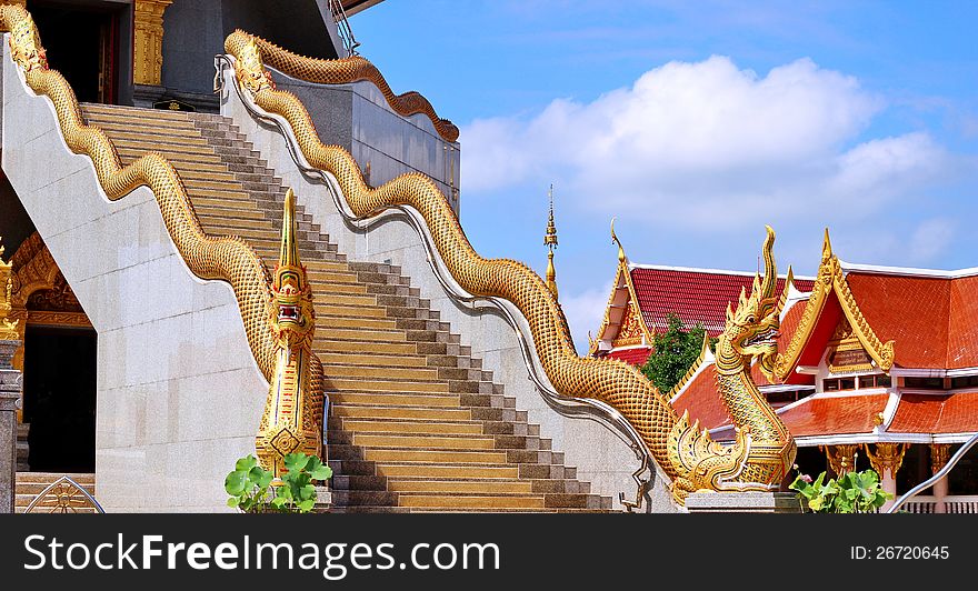 Naka on top of staircase balustrade at Pagoda of Phothisomporn temple, Udornthani province, Thailand. Naka on top of staircase balustrade at Pagoda of Phothisomporn temple, Udornthani province, Thailand
