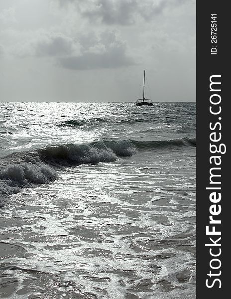 Surf at sunrise on the background of the yacht. Surf at sunrise on the background of the yacht