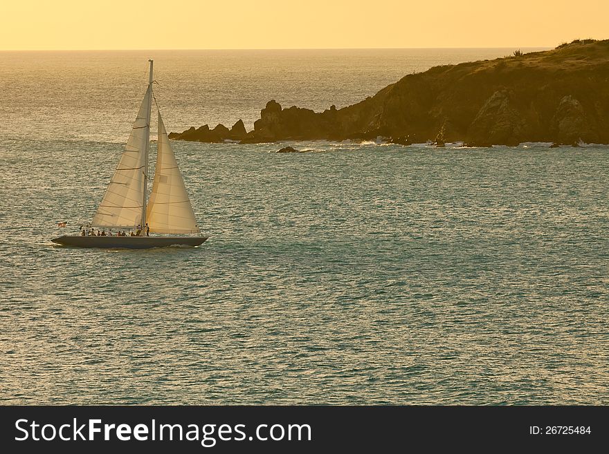 Sailboat At Sunset On The Caribbean Sea