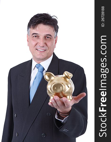 Smiling businessman holding a piggy bank, he is looking at the camera