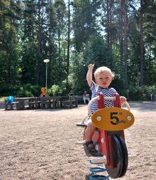 A Cute Young Boy Having Fun On The Playground Royalty Free Stock Image