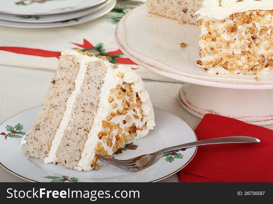 Slice of layer cake on a christmas plate