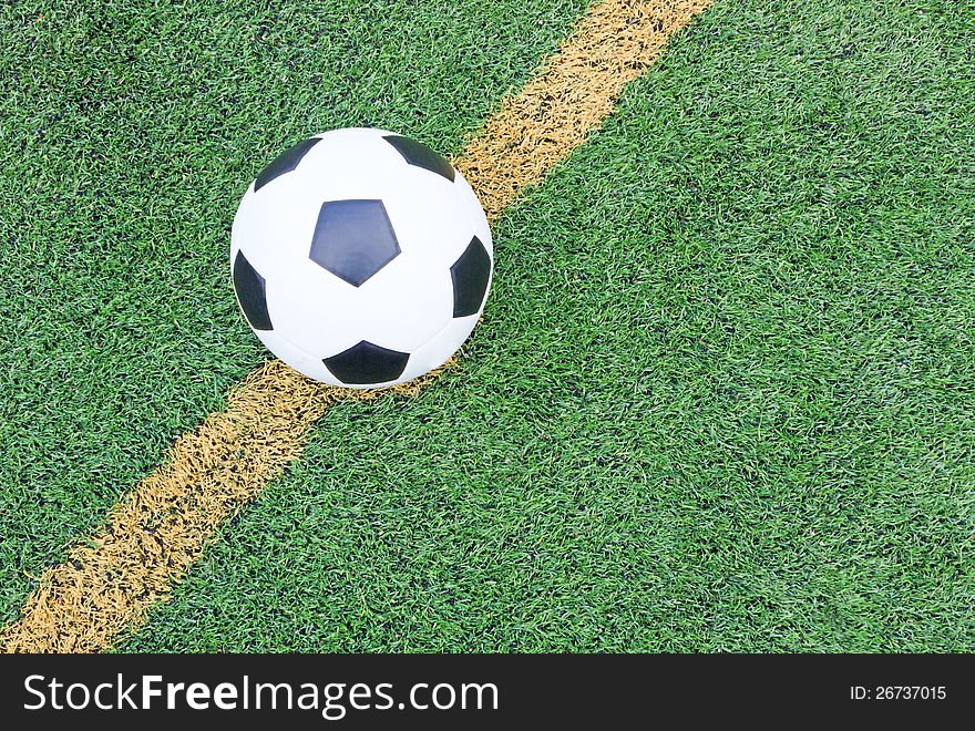 Soccer football field stadium grass line ball background texture light shadow on the grass