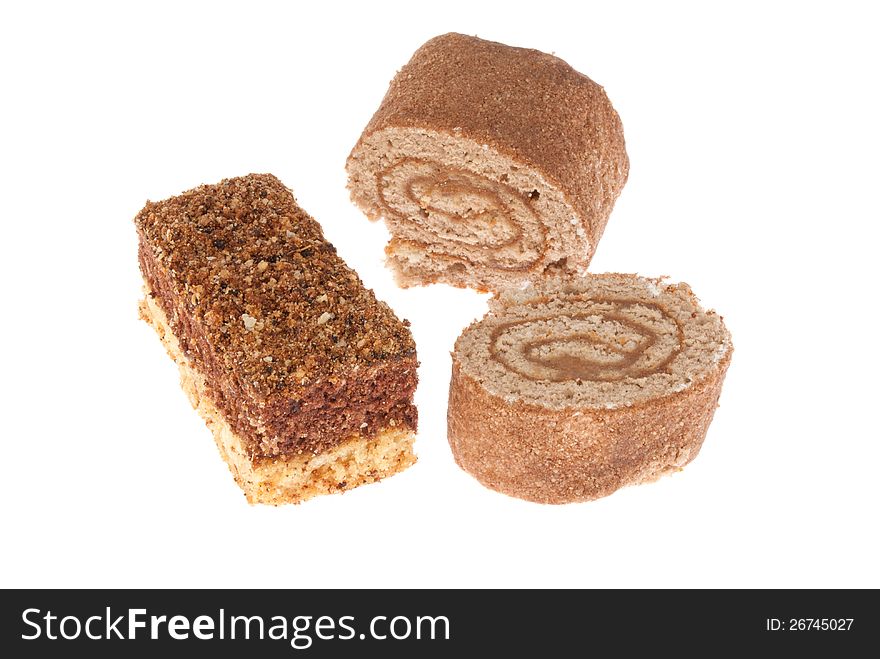 Delicious cakes on a white background. Isolated on a white.