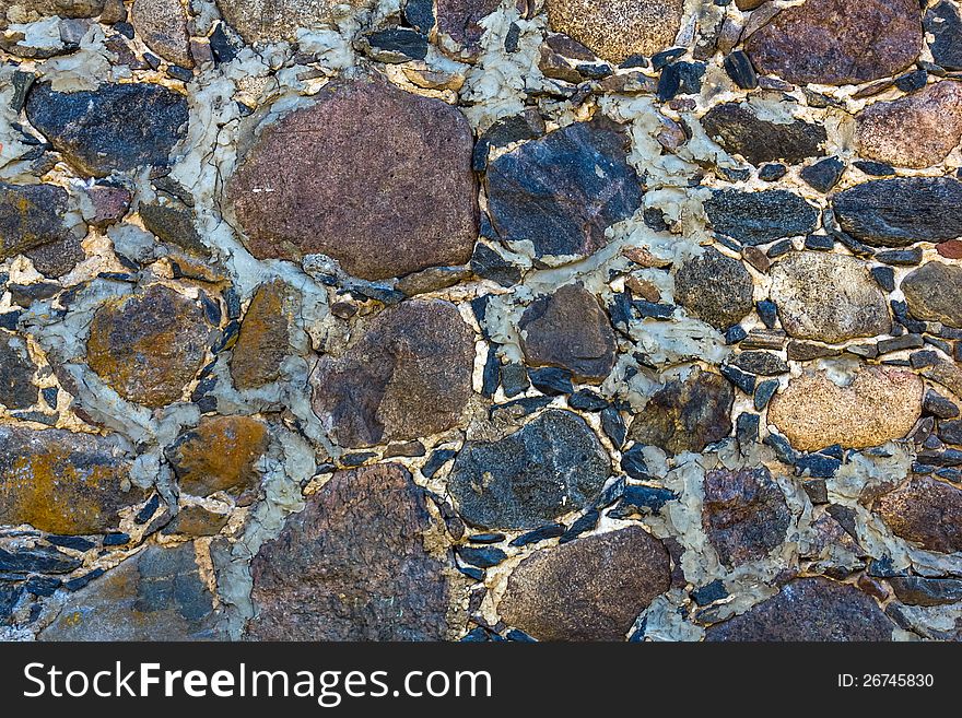 Stone background with large stones and pebbles. Stone background with large stones and pebbles