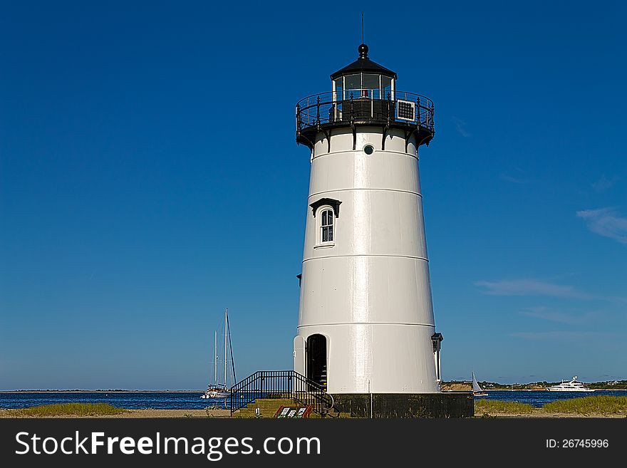 The Edgartown light house with a blue sky in the background