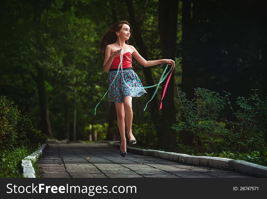 Girl in blue dress run