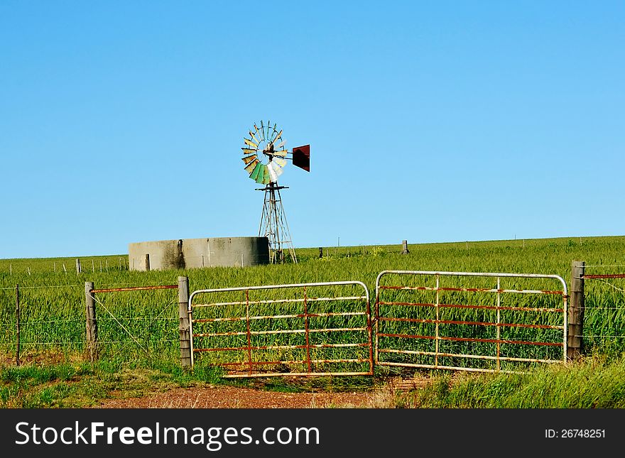 Landscape with windmill water pump on a farm westerncape south africa