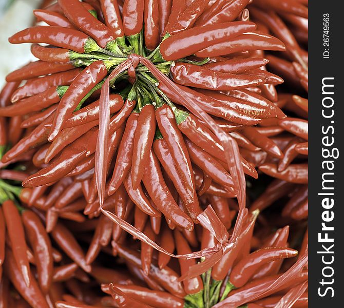 Red peppers for sale at a market.